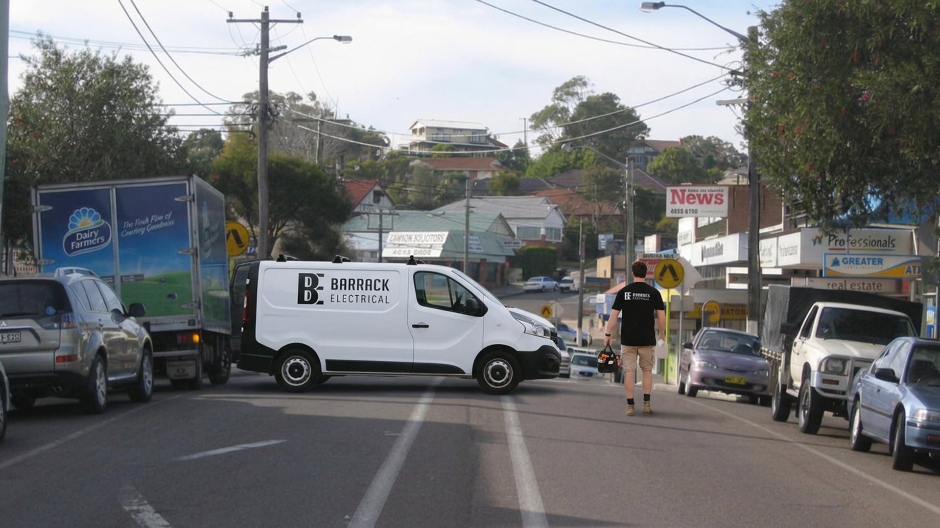 A Barrack Electrical van on Main Road at Cardiff, near the shops