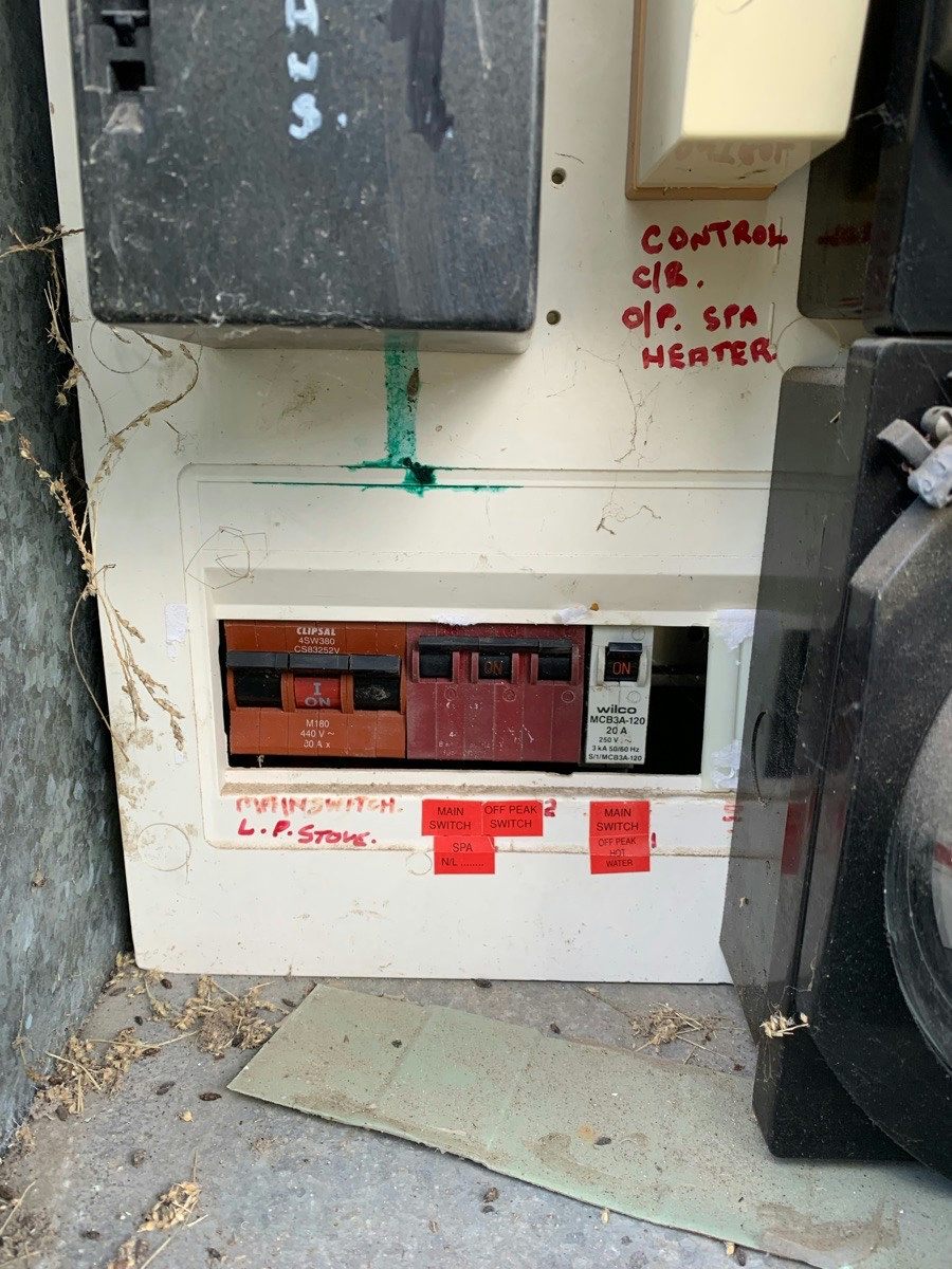 An old sub-board with the spa heater control circuit hand-labelled in red marker