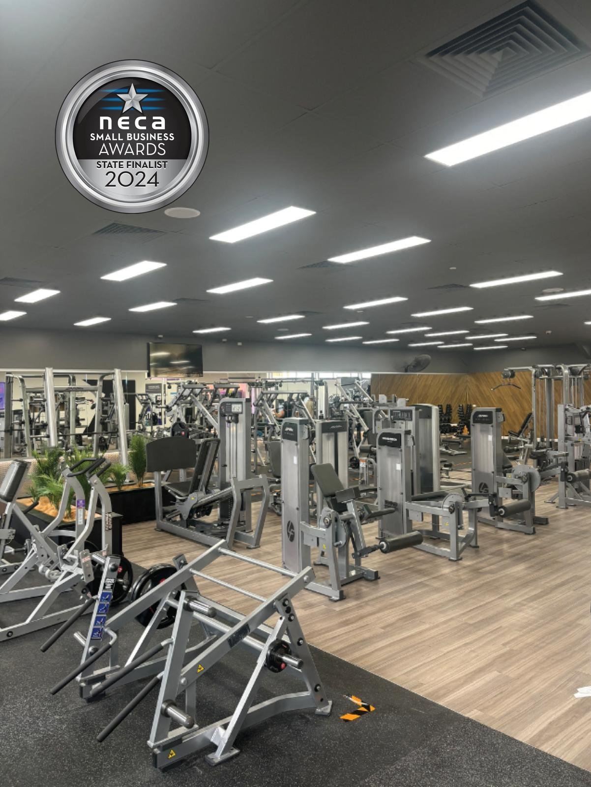 Rows of LED lighting installed by Barrack Electrical in a gym fit-out